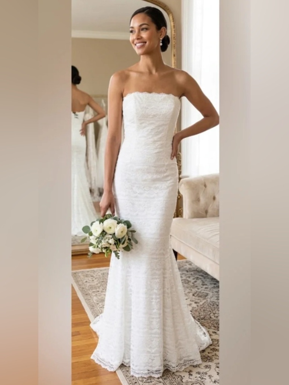 David's Bridal Galina Strapless trumpet silhouette with a short train.